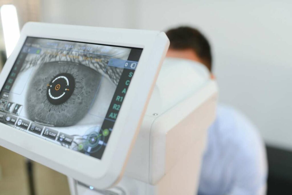 Close-up of an eye exam machine capturing a digital image of a patient’s eye during an eye health assessment.